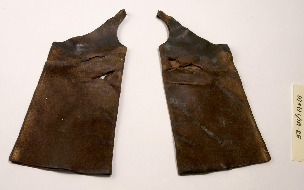 Pair of wrist and forearm protectors as used in tinplate work.