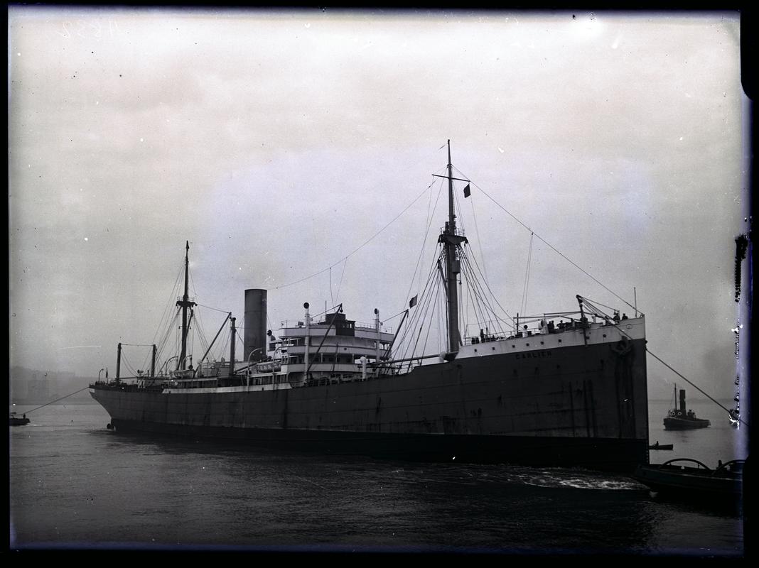 3/4 Starboardt Bow view of S.S. CARLIER with tug, c.1936.