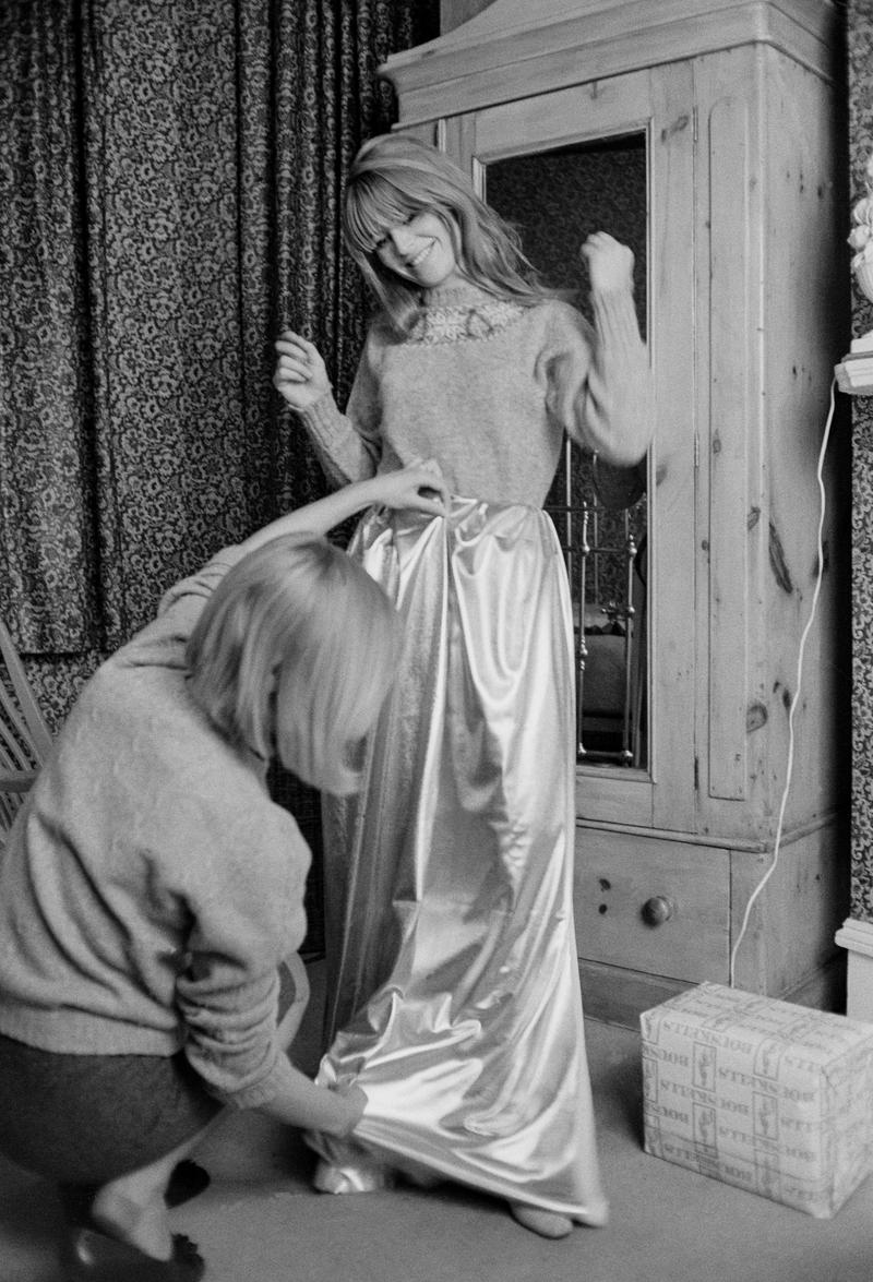 GB. ENGLAND. London. Actress Julie CHRISTIE being measured for a costume. 1965.