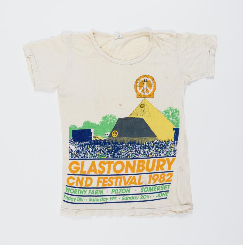 T-shirt for 'Glastonbury CND Festival 1982'. Held at Worthy Farm, Pilton, Somerset, 18 - 20 June 1982. Worn by Thalia Campbell.