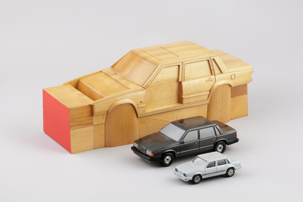 Wooden pattern for a model car. Believed to be a Volvo 760 GLE with model released in 1986. & Grey Volvo 760 GLE car model - hand made in resin, & Silver Corgi Junior Volvo car model