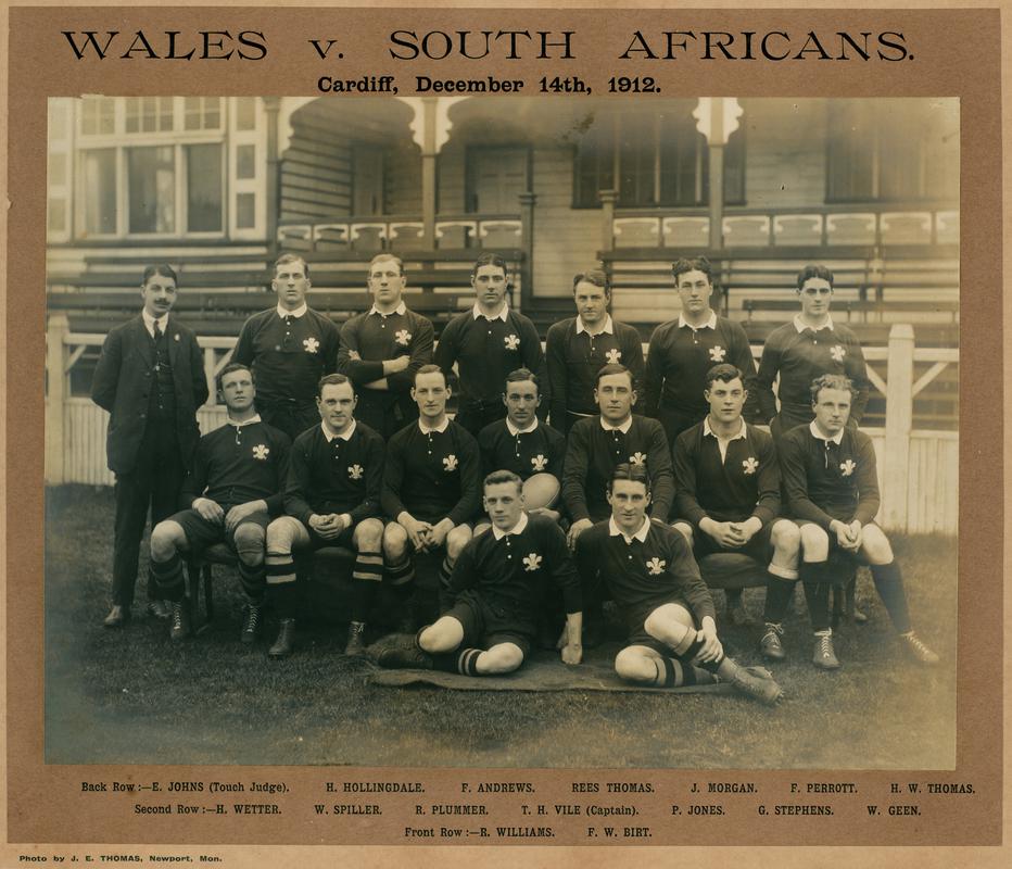 Photograph 'Wales v South Africans Cardiff, December 14th 1912' of Welsh rugby team with names printed below. Mounted on card.