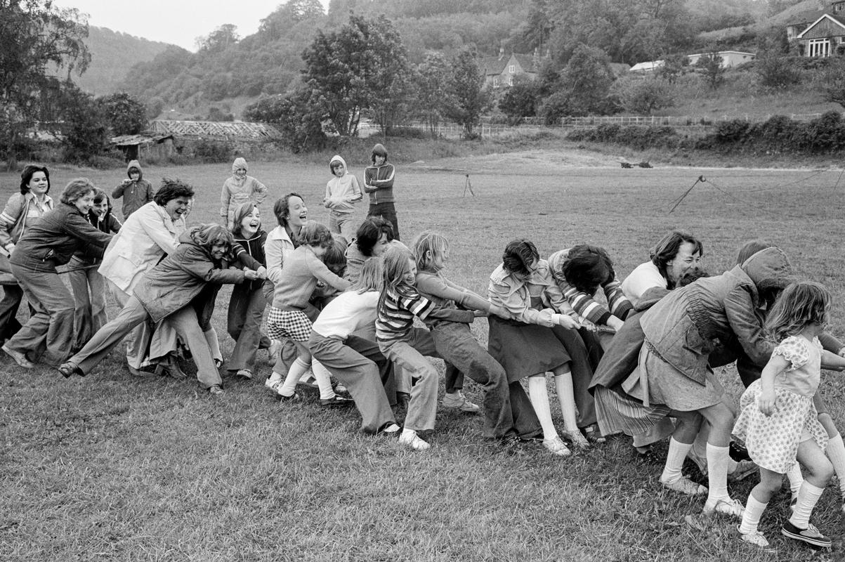 GB. WALES. Tintern. Queens Silver Jubilee Sports day, women's team for tug-of-war, in the rain. 1977