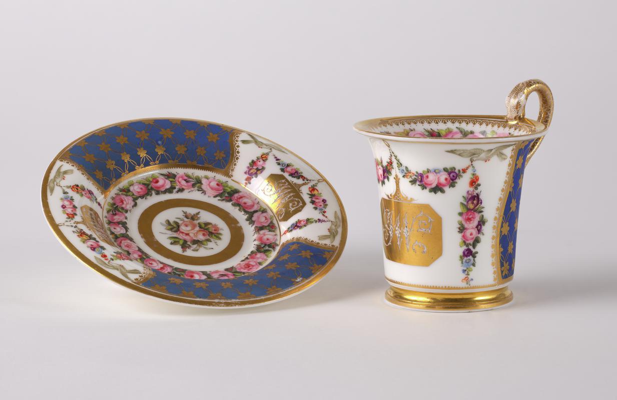 Cup, cabinet and saucer
