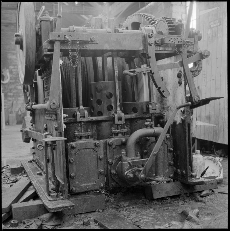 Black and white film negative showing a vertical three cylinder haulage engine at Coegnant Colliery.  It was made by Sheppards of Bridgend.  '25 Nov 1981' is transcribed from original negative bag.