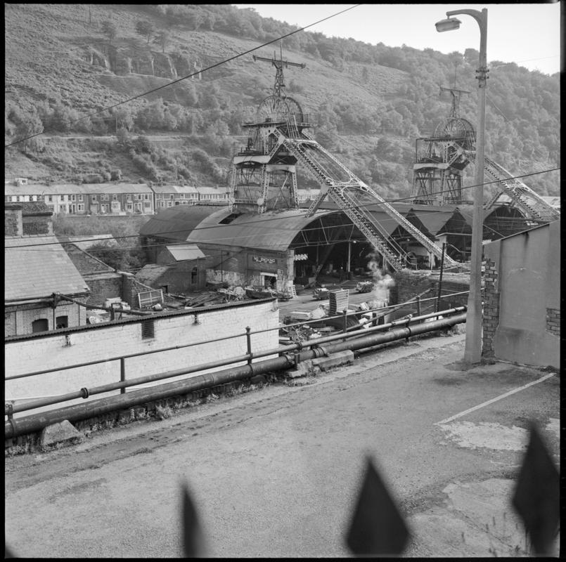 Black and white film negative showing the downcast and upcast headframes, Six Bells Colliery 23 September 1979.  'Six Bells 23 Sept 1975' is transcribed from original negative bag.  Appears to be identical to 2009.3/2915.