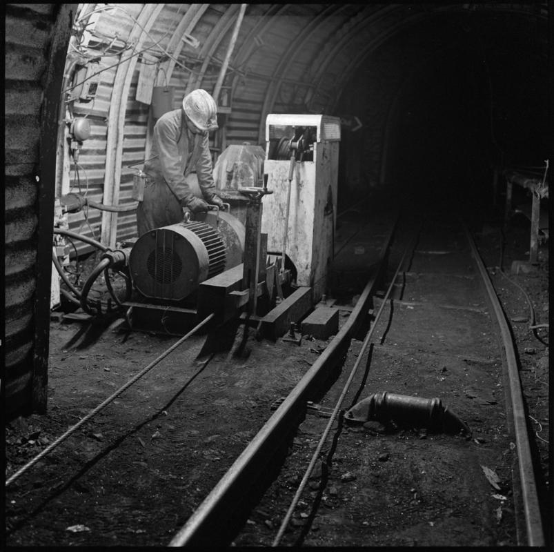 Black and white film negative showing a haulage engine? underground at Treforgan Colliery.  'Treforgan' is transcribed from original negative bag.