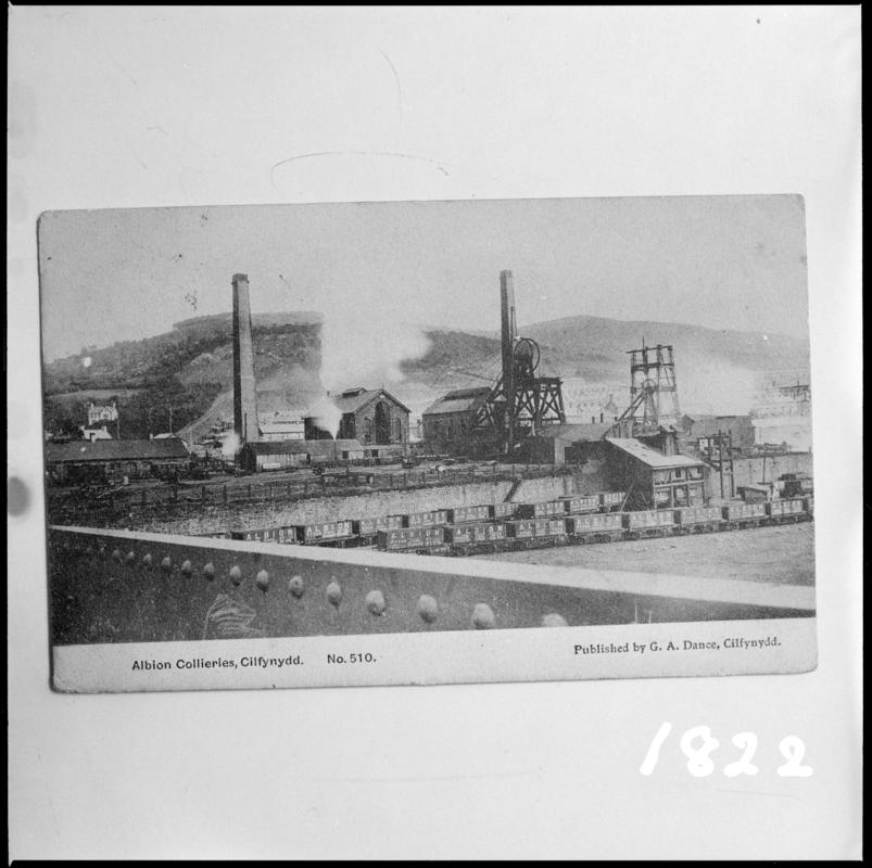 Black and white film negative of a photograph showing a surface view of Albion Colliery, Cilfynydd.   It was sunk in the 1880s and closed in 1966.  'Albion Colliery' is transcribed from original negative bag.