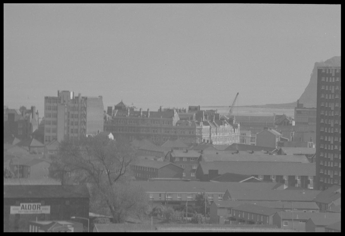 View over Butetown, with Loudoun Square Flats on right, Empire House on left and Penarth Head in background.