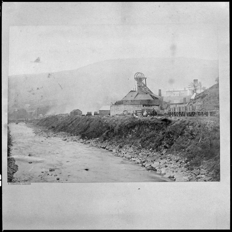 Black and white film negative of a photograph showing a general surface view of Cymmer Colliery, 1860s.   'Cymmer' is transcribed from original negative bag.