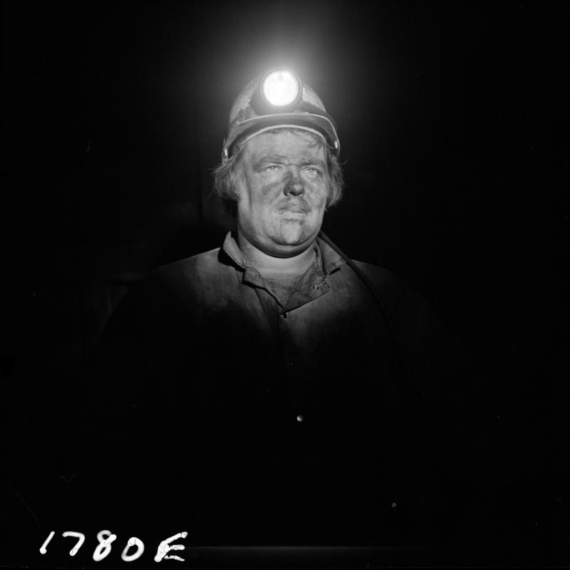 Black and white film negative showing a miner, Blaengwrach Mine, 1 November 1979.  'Blaengwrach 1 Nov 1979' is transcribed from original negative bag.  Appears to be identical to 2009.3/1341, 2009.3/1342, 2009.3/1343 and 2009.3/1346.
