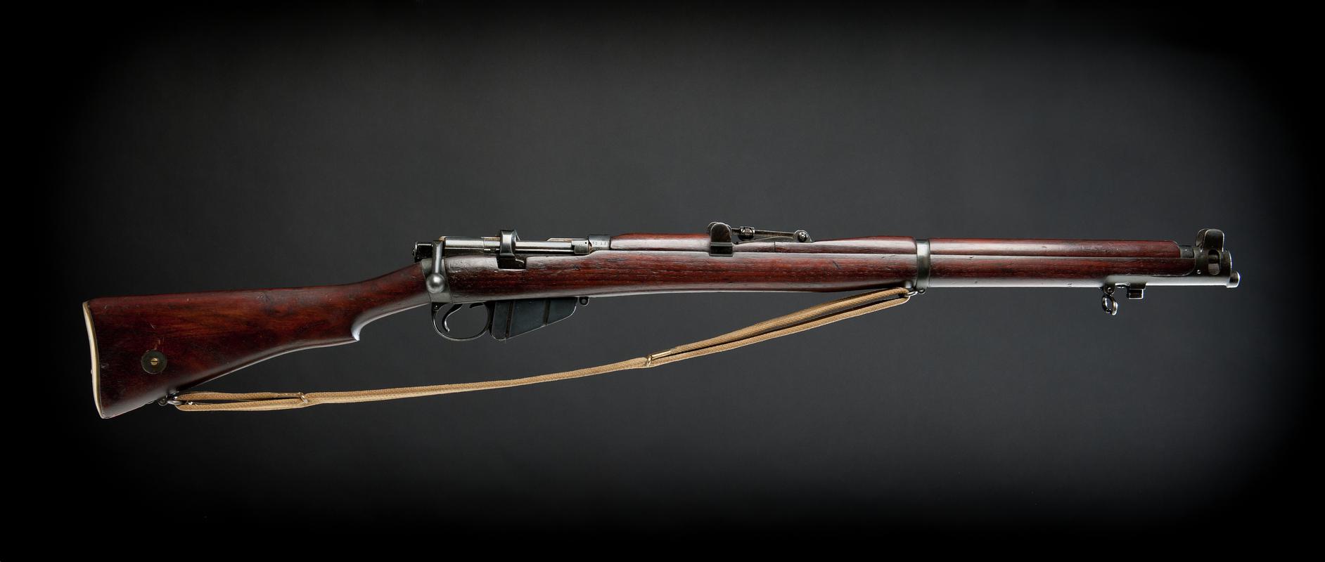 Lee Enfield bolt action rifle mark 3, with a breech-carrying strap.
