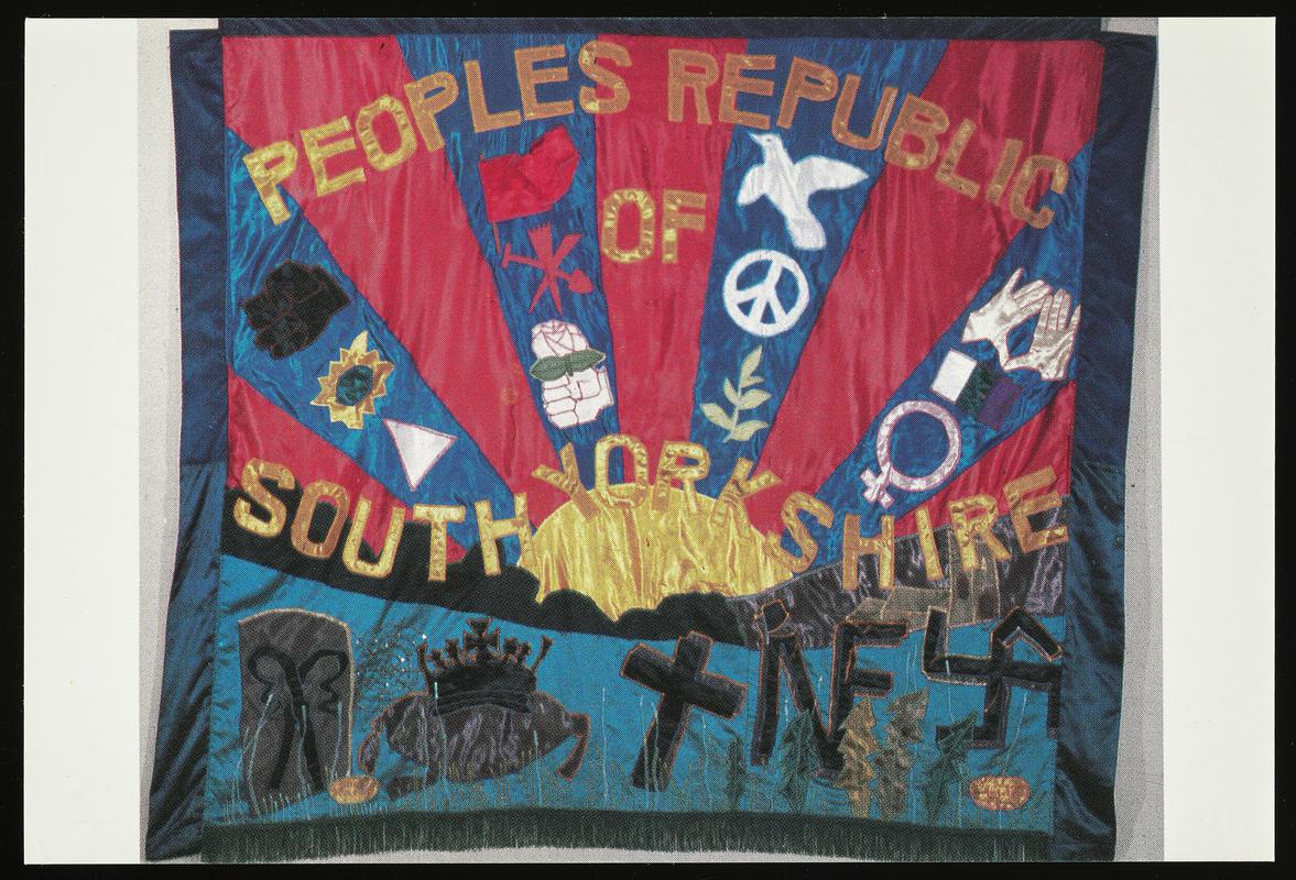 Colour postcard of a Peoples Republic of South Yorkshire banner. The original banner was designed by Thalia Campbell in 1878 and made in 1984 for Lois and Colette Cameron-Miller who lived in Sheffield.