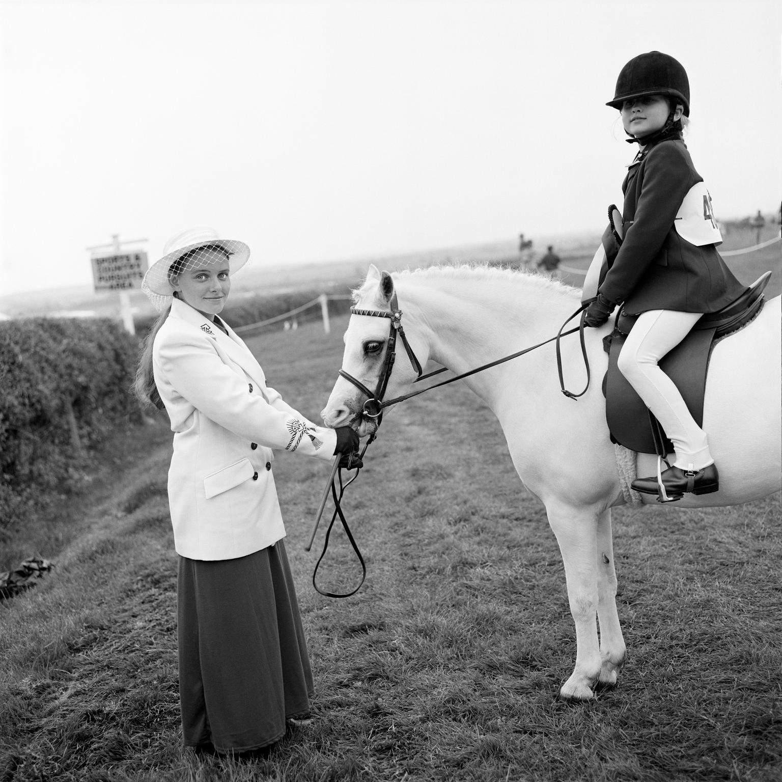 Anglesey show. Sian Jones, horse handler and 7 year old rider Kelsie Beattie. Cardiff, Wales