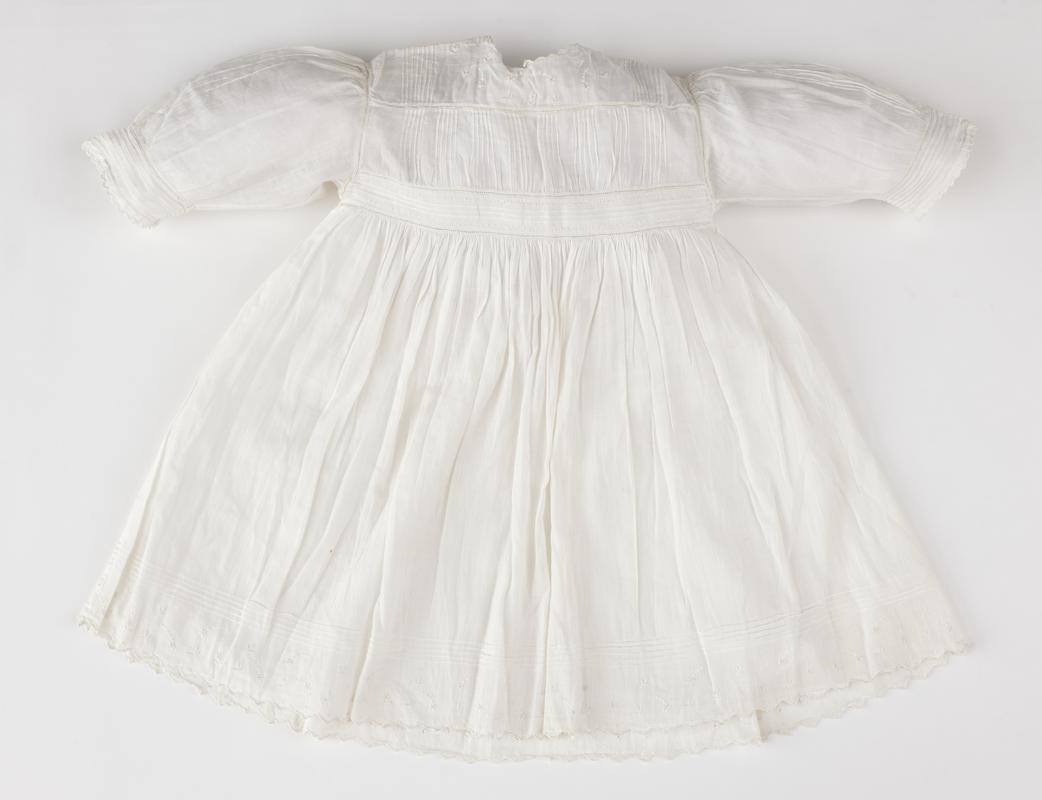 Baby's white cambric frock with high waistline