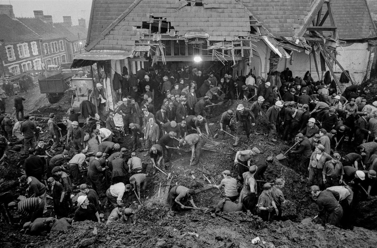 GB. WALES. Aberfan. The Aberfan disaster was a catastrophic collapse of a colliery spoil tip in the Welsh village of Aberfan, on 21 October 1966, killing 116 children and 28 adults. It was caused by a build-up of water in the accumulated rock and shale, which suddenly started to slide downhill in the form of slurry. 1966