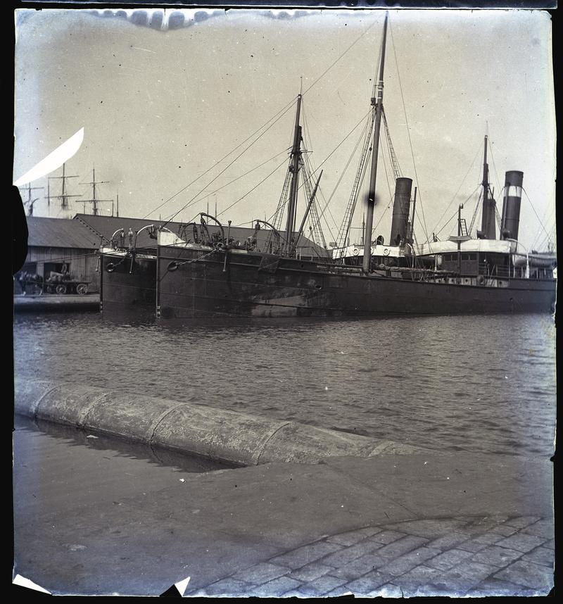 Port view of ss EARL OF ROSEBERRY, built 1880 for Martin & Marquand of Cardiff, with an unidentified tramp steamer in the Bute East Basin, Cardiff.