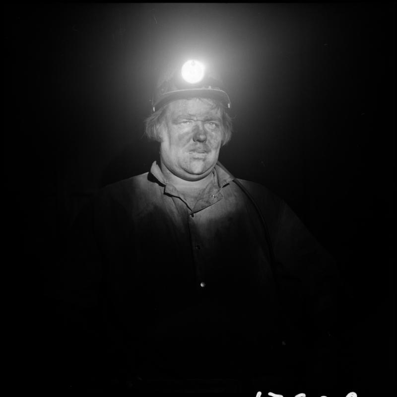 Black and white film negative showing a miner, Blaengwrach Mine, 1 November 1979.  'Blaengwrach 1 Nov 1979' is transcribed from original negative bag.  Appears to be identical to 2009.3/1341, 2009.3/1343, 2009.3/1345 and 2009.3/1346.