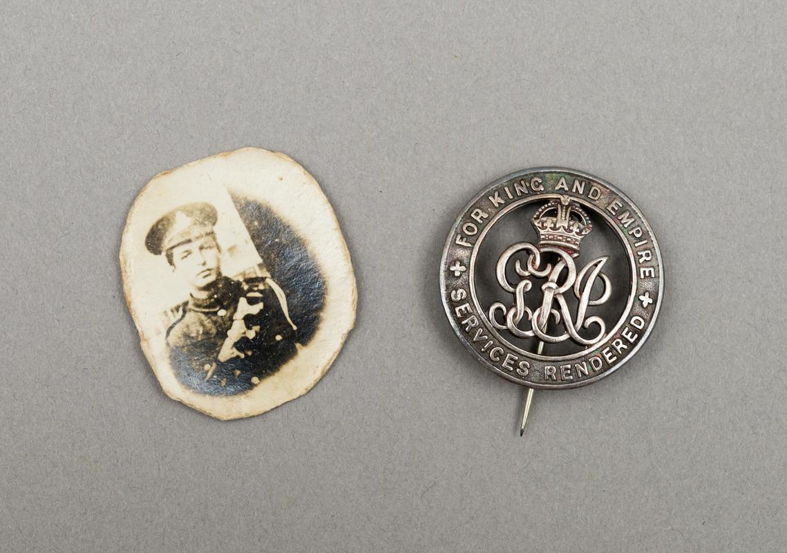 Lapel badge and photograph