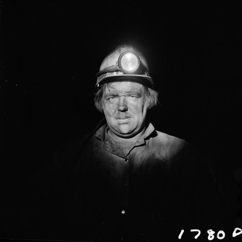 Black and white film negative showing a miner, Blaengwrach Mine, 1 November 1979.  'Blaengwrach 1 Nov 1979' is transcribed from original negative bag.