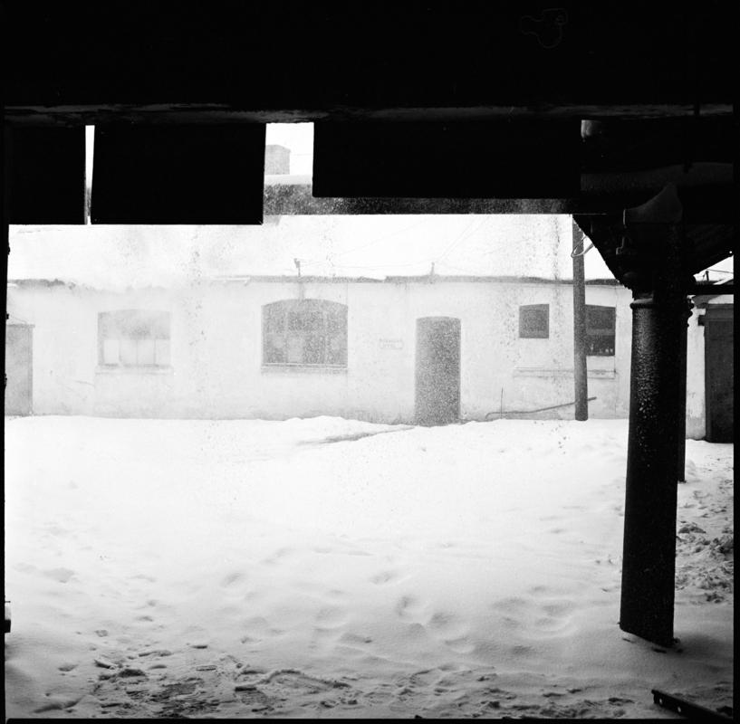 Black and white film negative showing Big Pit yard and buildings.