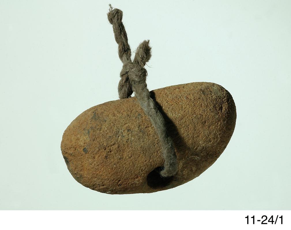 Holed stone amulet