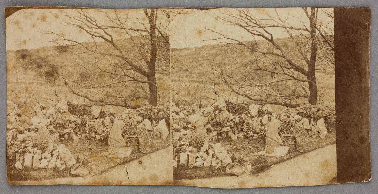 Garden path with chair and basket, photograph