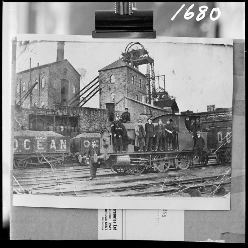 Black and white film negative of a photograph showing a  0-6-0 tank engine with a police guard during one of the many strikes, Deep Navigation Colliery.