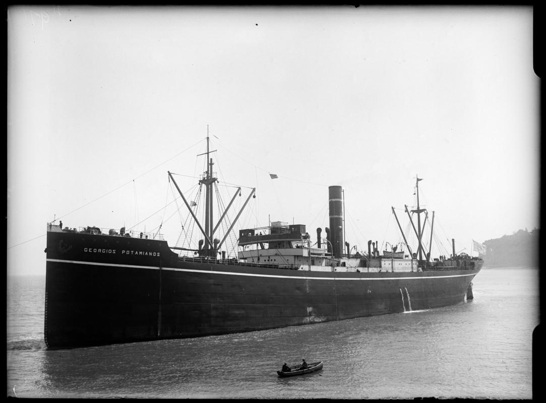 Three quarter Port bow view of S.S. GEORGIOS POTAMIANOS and waterman's boat, 1939.