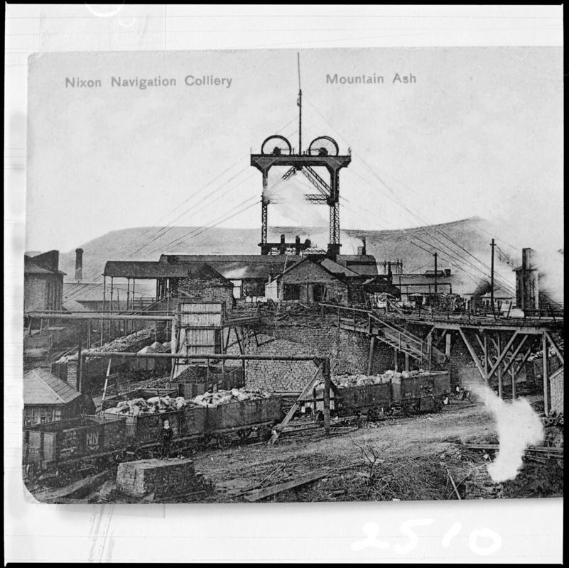 Black and white film negative of a photograph showing a surface view of Nixon's Navigation Colliery. 'Nixons Nav Mountain Ash' is transcribed from original negative bag.