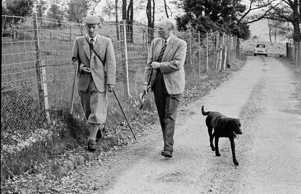 GB. SCOTLAND.  The head of the Clan Cameron of Locheal walks around his estate with his Head Gamekeeper. 1967.