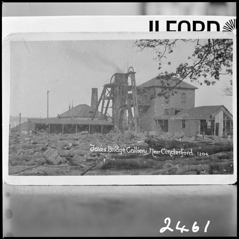 Black and white film negative of a photograph showing a surface view of Foxes Bridge Colliery, Cinderford.  'Foxes Bridge' is transcribed from original negative bag.