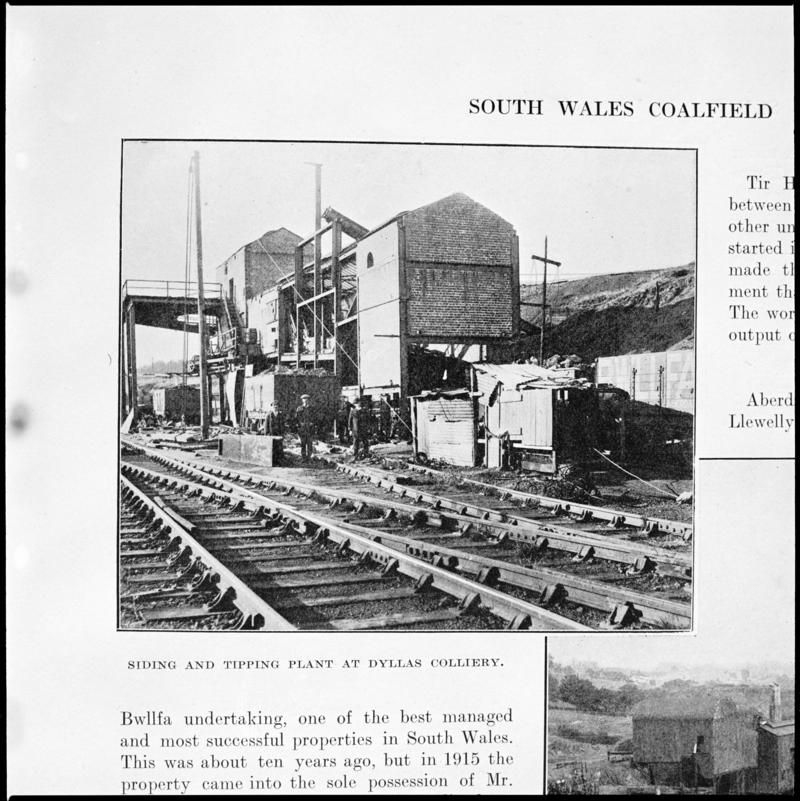 Black and white film negative showing siding and tipping plant at Dyllas Colliery, photographed from a publication. 'Dyllas Colliery' is transcribed from original negative bag.