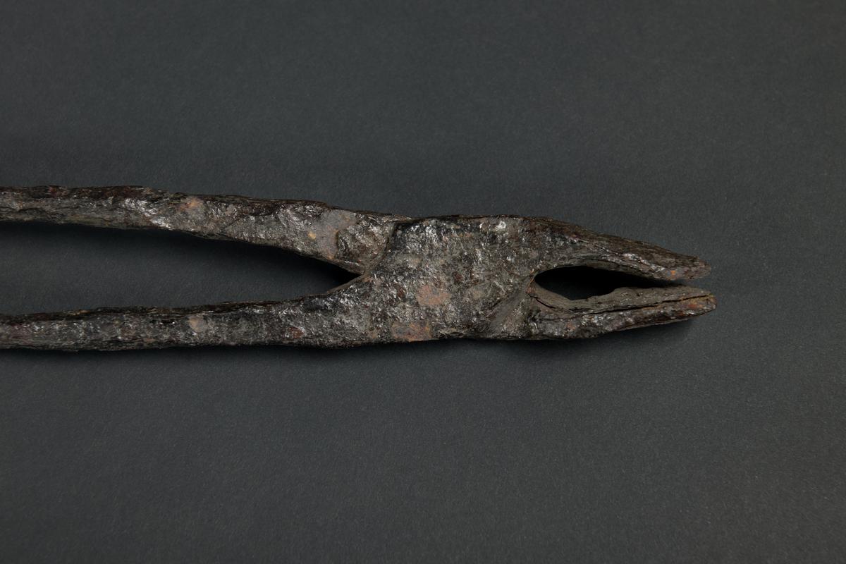 Medieval iron tongs