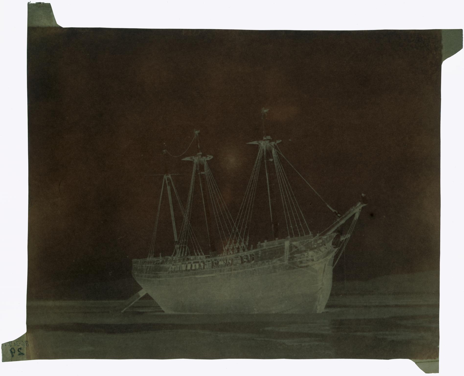 Three masted barque on beach, paper negative