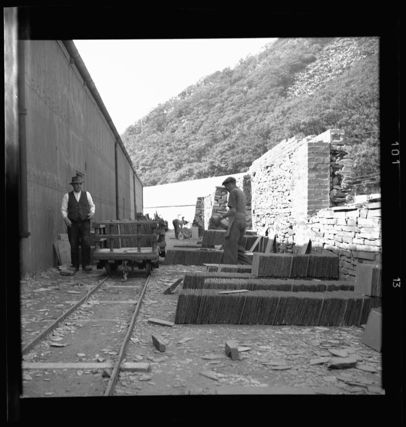 Roofing slates being loaded into wagons to be transported to the slate quay, Dinorwig Quarry, early 1960s.