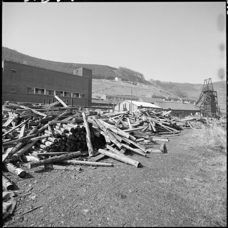Black and white film negative showing a view of the baths, upast shaft and timber yard, Cwmtillery Colliery.  'Cwmtillery' is transcribed from original negative bag.
