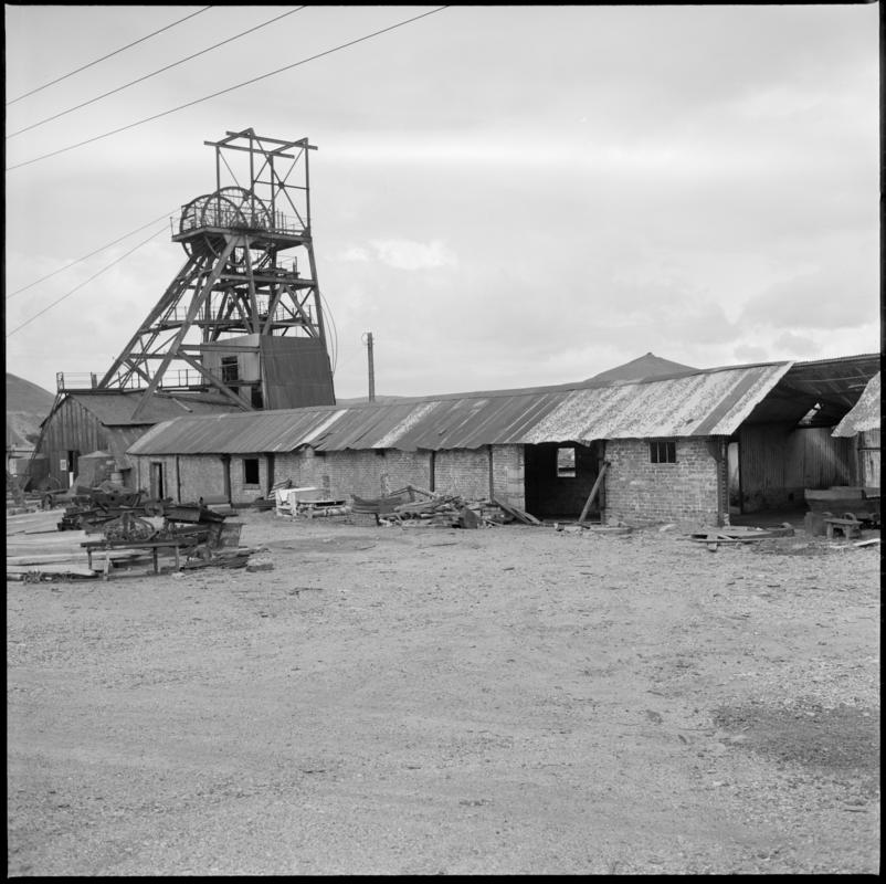 Black and white film negative showing a surface view of Big Pit Colliery, 1975.  'Blaenavon 1975' is transcribed from original negative bag.