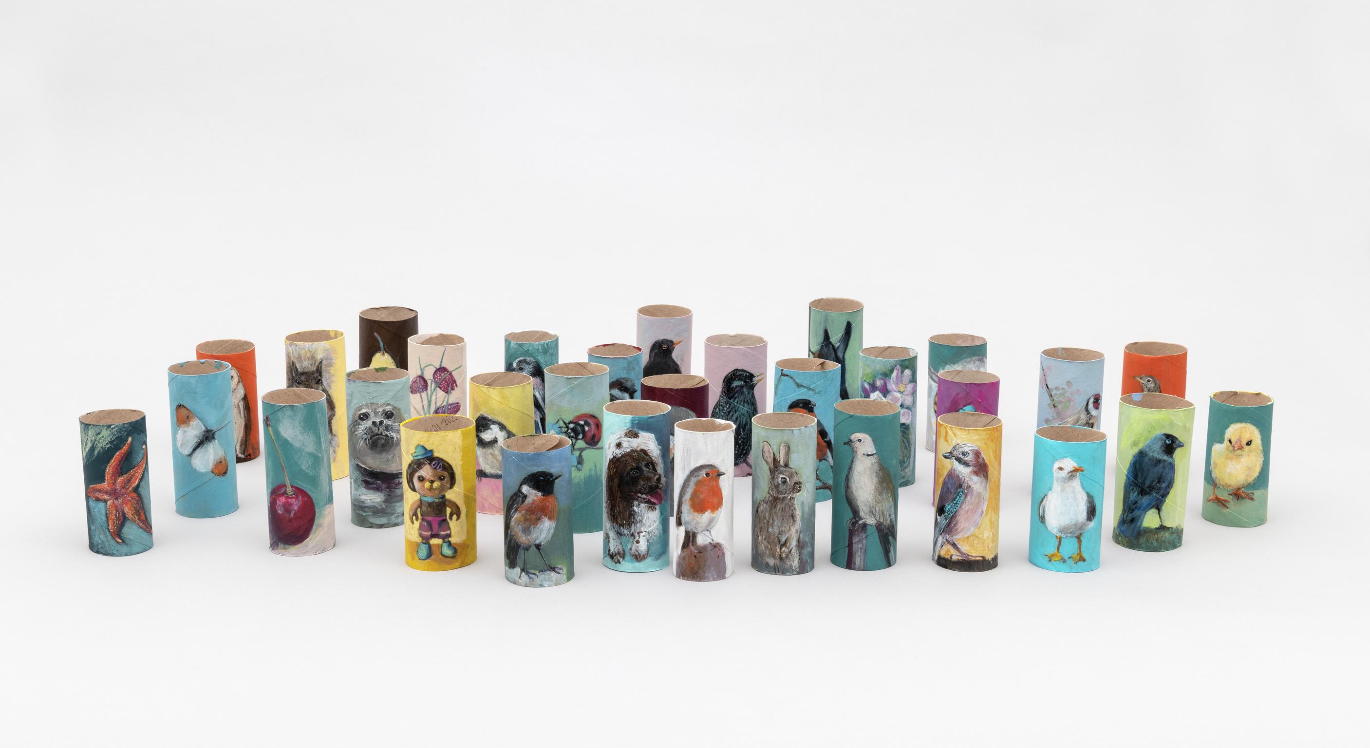 Group shot of Handpainted toilet roll by Carys Evans