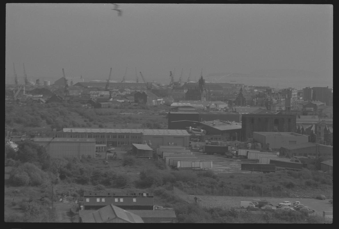 View of Butetown, looking south over docks with Flat Holm and Steep Holm in the background, and Collingdon Road in the foreground.