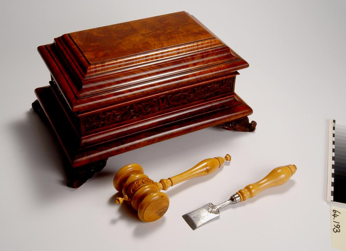 Casket containing mallet and chisel