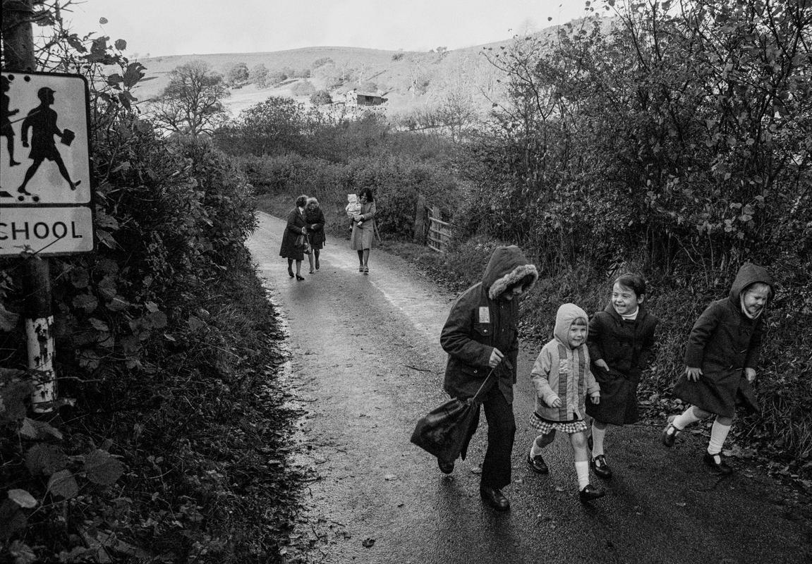 GB. WALES. Llaneglwys. The smallest school in the UK. Four students. Evening trip home. 1977.