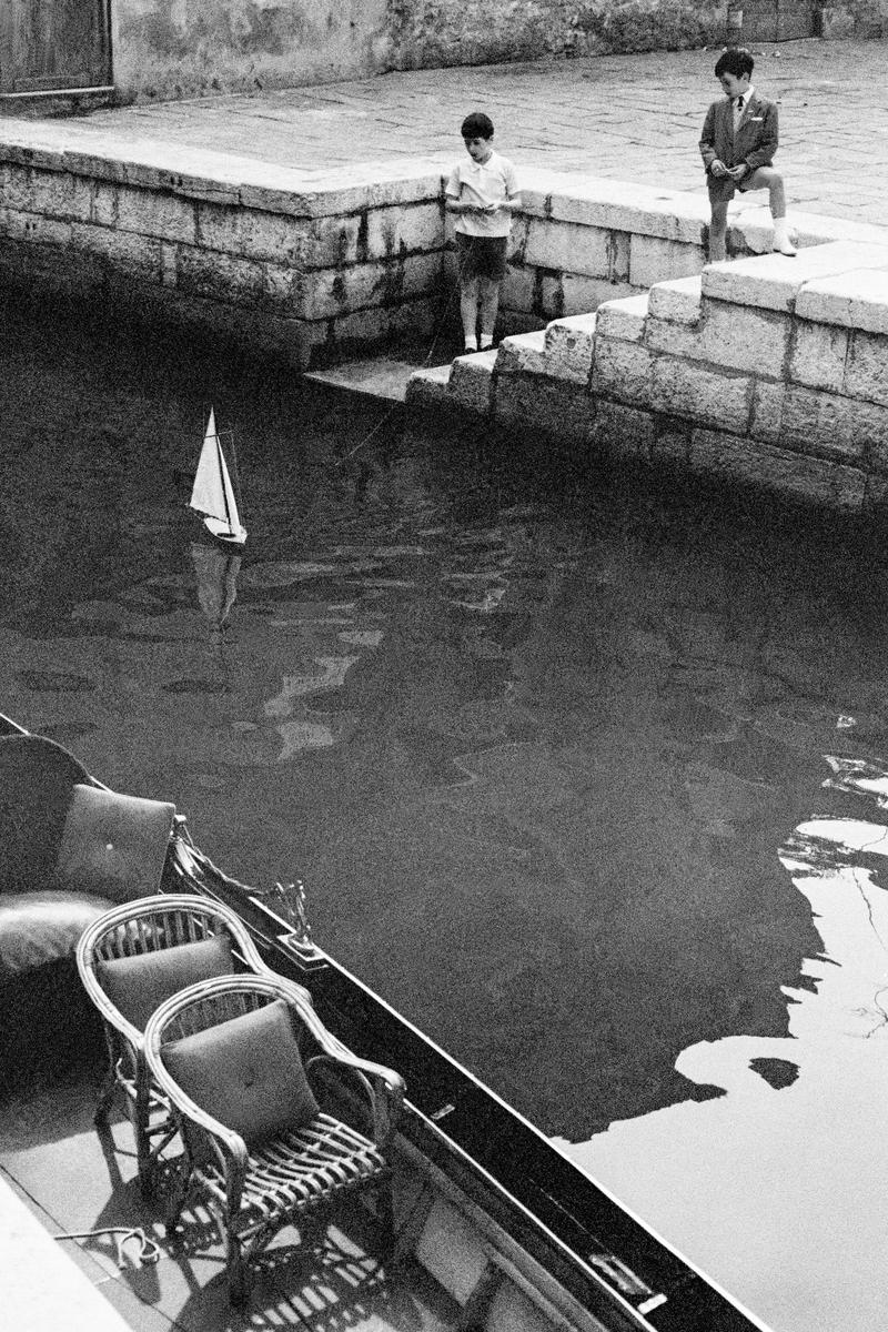 ITALY. Venice. Sailing on a canal in Venice. 1964.