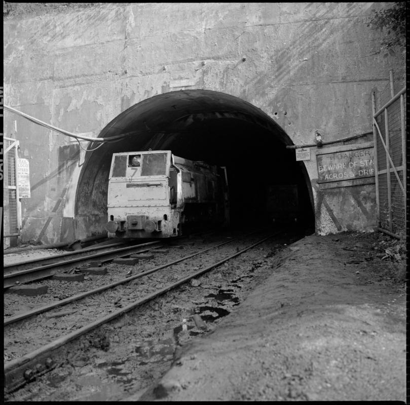 Black and white film negative showing an electric locomotive leaving the mine. 'Blaengwrach' is transcribed from original negative bag.  Similar to 2009.3/2442, 2009.3/2443 and 2009.3/2445.