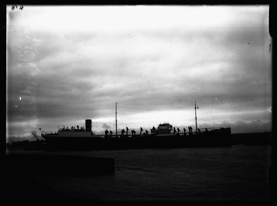 Starboard broadside view of M.V. CAPRELLA and tug, c.1936.