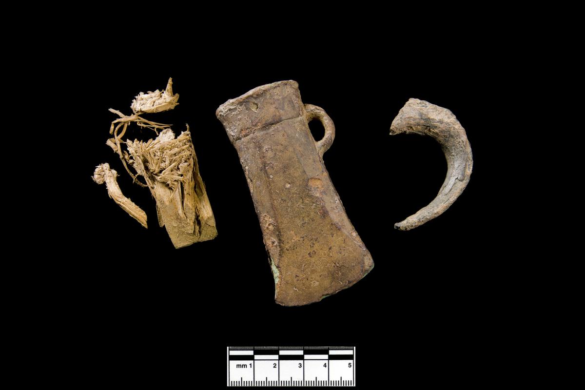 bronze socketed axe, preserved wooden fragments from axe and tin fragment - Group Shot