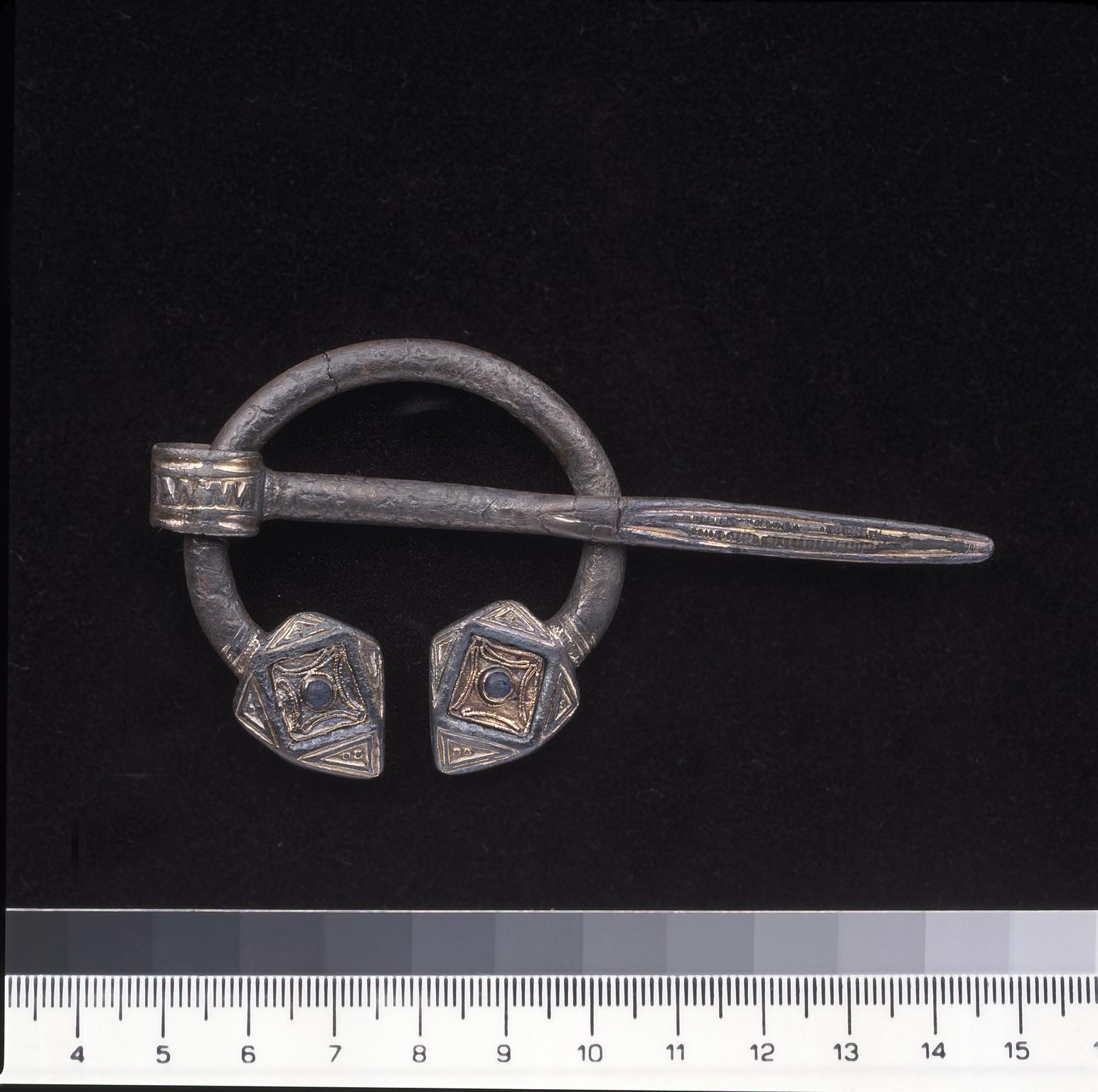 Early Medieval silver penannular brooch