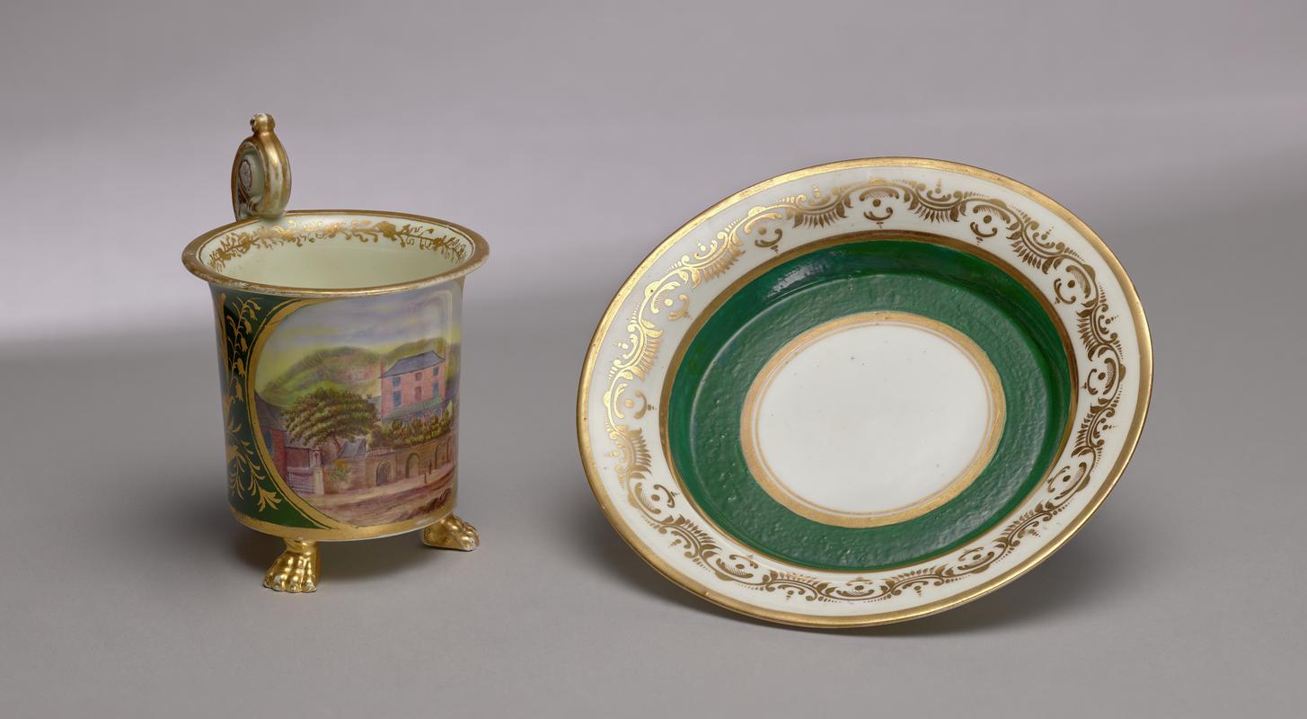 Cup, cabinet and saucer