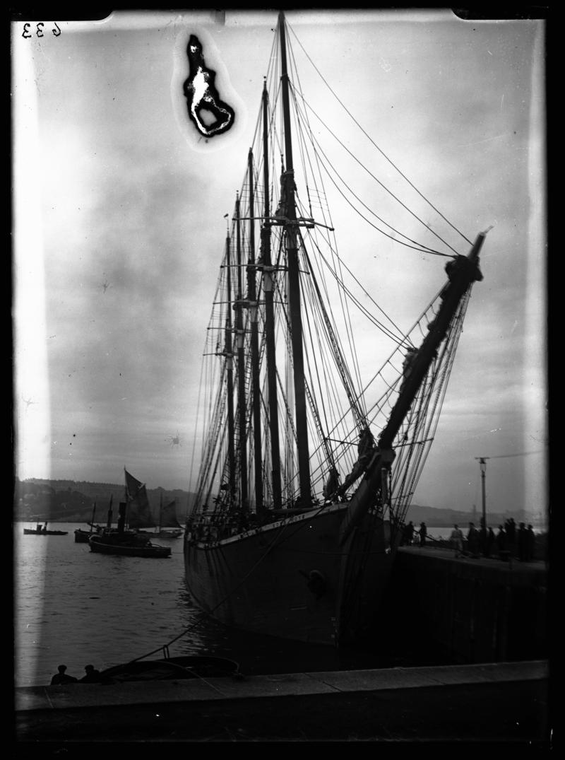Bow view of the five masted schooner EDNA HOYT with tug & ketch, 1936-1937