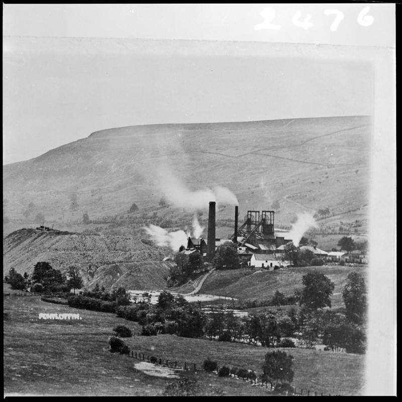 Black and white film negative of a photograph showing a surface view of a Rhymney Merthyr Colliery, Pontlottyn.  'Pontlottyn' is transcribed from original negative bag.